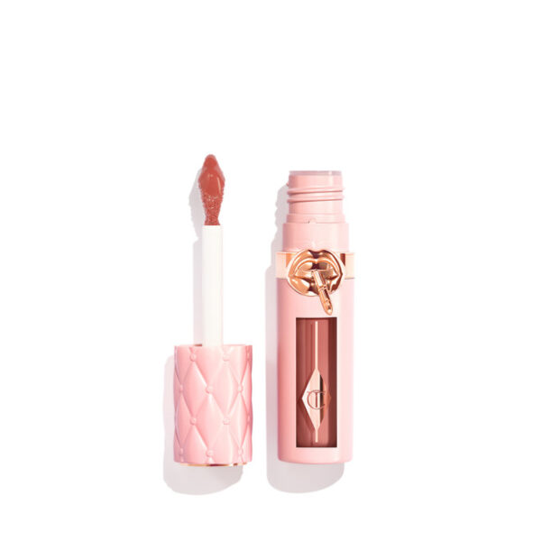 Roze lipgloss met applicator, luxe verpakking, glanzende afwerking. Perfect voor een stralende look.