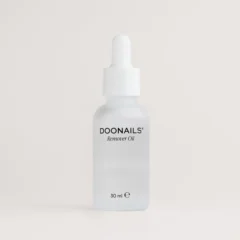 DOONAILS Remover Oil in transparant flesje van 30 ml met pipetdop, ideaal voor nagelverzorging en effectieve verwijdering.