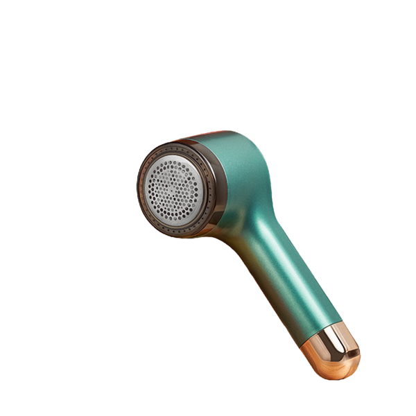 Modern groene pluisverwijderaar met metalen kop voor kledingmateriaal en tapijtonderhoud.