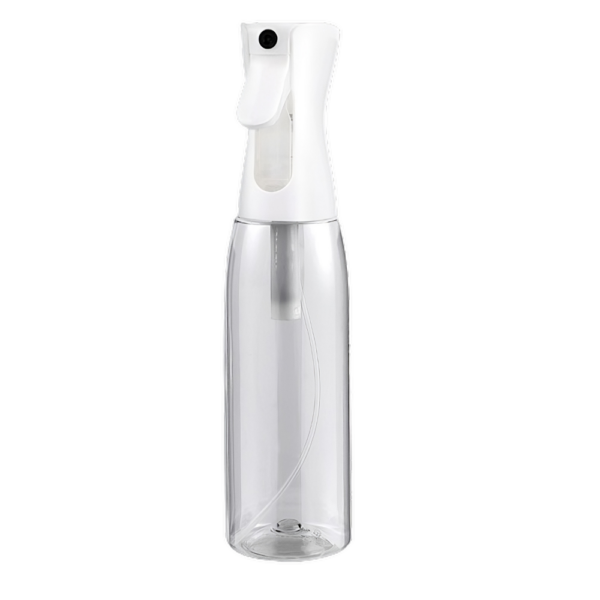 Doorzichtige verstuiver fles met witte dop voor haarstyling of plantenverzorging.