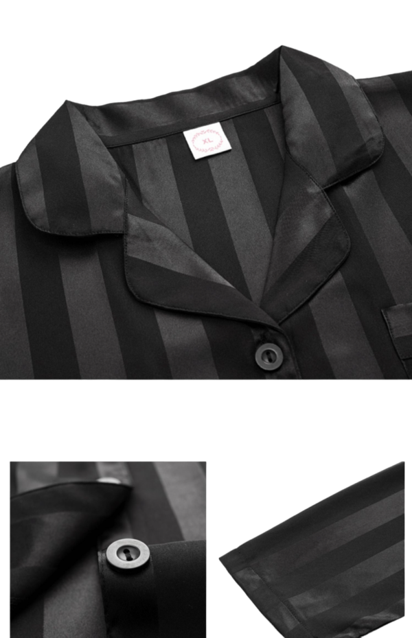 Zwarte gestreepte satijnen pyjama met knoopdetail en kraag, geschikt voor comfortabele nachten en stijlvolle loungewear.
