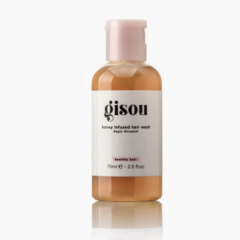 Gisou honing shampoo fles van 75 ml voor gezond en glanzend haar, verrijkt met natuurlijke ingrediënten.