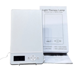 Witte lichttherapielamp met energieverhogende functie, inclusief digitale timer en verpakking met specificaties.