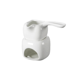 Witte keramische oliebrander met elegant design voor aromatherapie en sfeervolle momenten thuis.