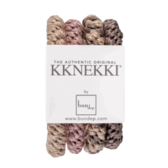 Veelzijdige Kknekki haarelastieken in diverse pastelkleuren, verpakt voor stijlvol dagelijks gebruik.