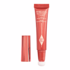 Roze beauty light wand blush met dop, ideaal voor een stralende make-up look.