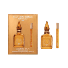 Charlotte Tilbury Star Confidence parfumset met fles en roller in luxe goudkleurige verpakking.