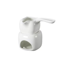 Witte keramische oliebrander met elegant design voor aromatherapie en sfeervolle momenten thuis.