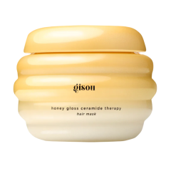 Gele honingachtige haarmasker van Gisou voor glanzend haar en diepgaande ceramide-therapie.