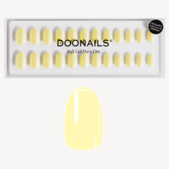 Alt-tekst: Doonails zachte gel nagels, gele nepnagels in een verpakking met verschillende maten.