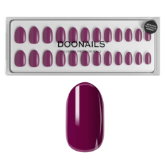 Alternatieve tekst: Doonails herbruikbare druknagels in dieproze tint, ideaal voor een snelle manicure.