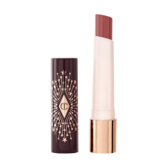 Luxe lipstick in een stijlvolle huls met sterrendecoratie, lichtroze tint, ideaal voor elegante make-uplooks.