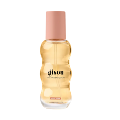 Geurige haarparfumfles met honingextract. Perfecte haarverzorging van Gisou voor een frisse geur.