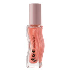 Gisou honinglipolie in een trendy fles voor glanzende, gehydrateerde lippen met een vleugje kleur.