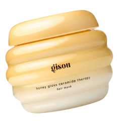 Gisou Honey Gloss ceramide haarmasker in een stijlvolle, gele verpakking voor glanzend en gezond haar.