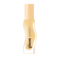 Gisou honinginfused lip olie in een elegante, gouden flacon voor verzorgde en glanzende lippen.